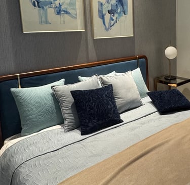 A clean bedroom with mattress and pillows