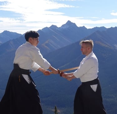 Aikidō and kenjutsu training with wooden swords (bokken) emphasizing timing, distance and ki.