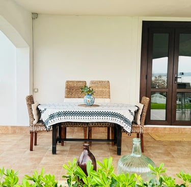 Covered terrace with dining table at luxury seaside villa in Sicily, Villa Incanto on the Sea