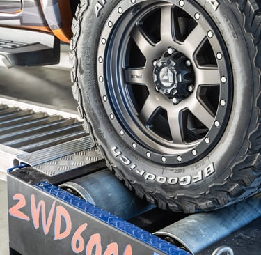 Engineered Tuning's car on the dyno machine