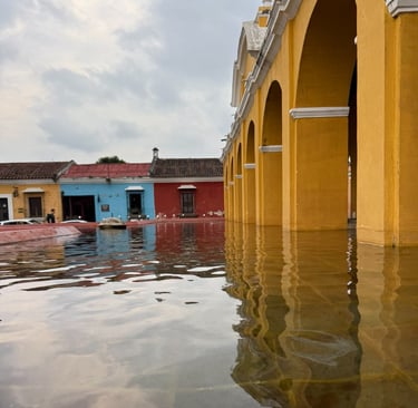 a boat is sitting in the water near a building