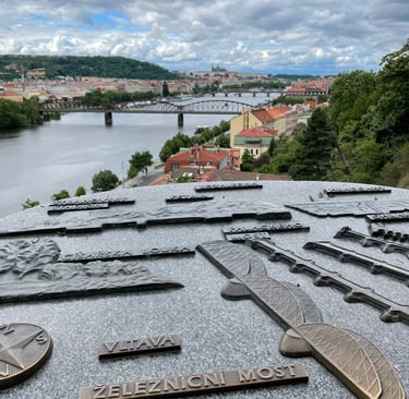 A map in the foreground and a river and bridges in the background