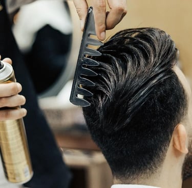 a man with a haircut and a haircut