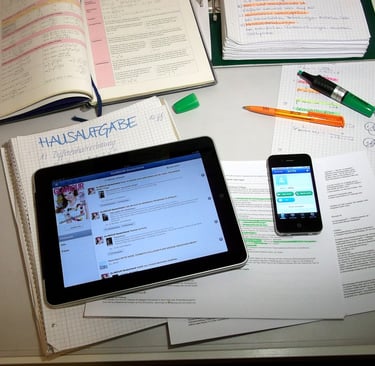 a tablet computer and a tablet computer on a desk