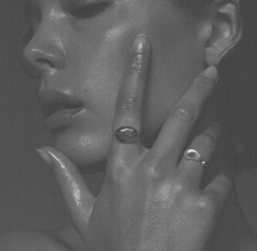 a woman with a ring on her finger