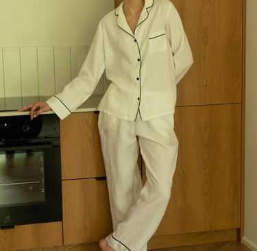 a woman in a white pajamas and pajamas