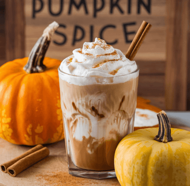 pumpkin spice iced coffee in a short glass