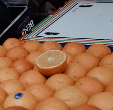 a bunch of oranges are sitting on a table