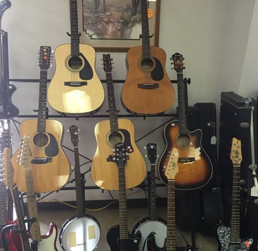 Guitars For Sale,we pawn guitars,we buy guitars