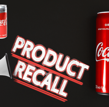 Coca-Cola can next to a megaphone and bold text reading ‘Product Recall’ — concept image for FDA recall of Coca-Cola sodas in