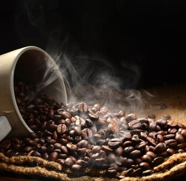 A cup with roasted coffee beans