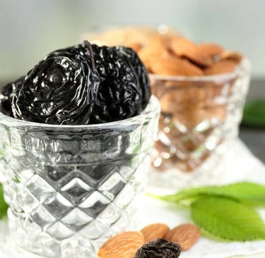 Prunes and almonds in galsses