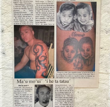 Carl Cocker on newspaper, Borneo tattoo, 2003