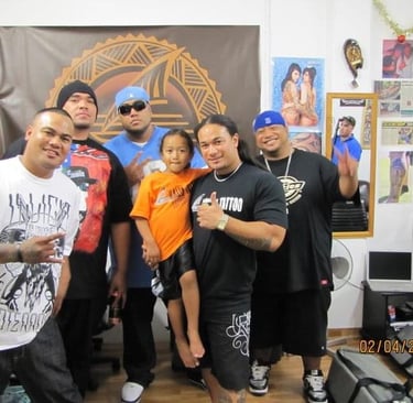 Dawn Raid Ent NZ Hiphop artists Savage, Devolo, Mareko + Polynesian tattoo artist Carl Cocker