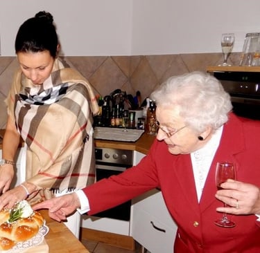 young woman and grandma in kitchen, dressed up - copyright Tanja Dietzig