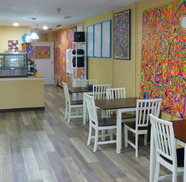 View of customer counter from just inside front door.