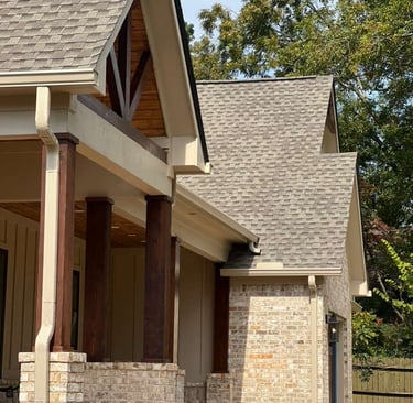 Seamless one-piece aluminum gutter installed on a residential roof.