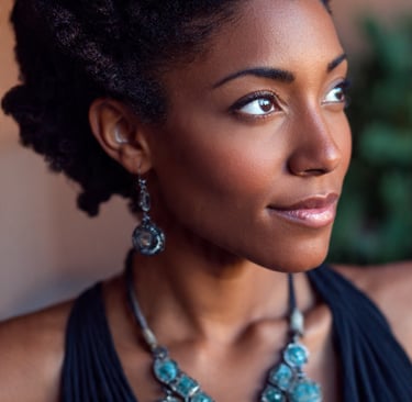 a black woman smiling and wearing her natural hair 