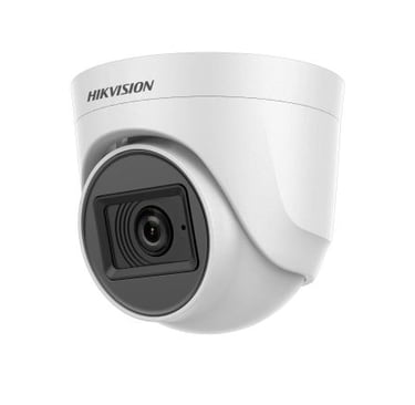 a camera mounted on a wall with a white background