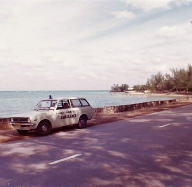 Bahamas Humane society ambulance parked at beautiful beach.