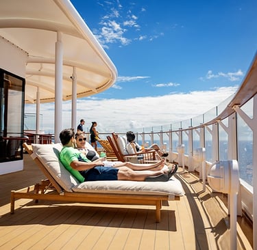 Adults relax on the deck of Disney Cruise Line