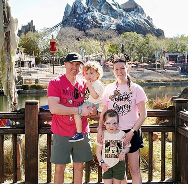 Aimee Cochrane and family pictured at Disney's Animal Kingdom® inside Walt Disney World®.