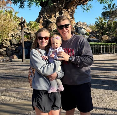 Payton King pictured with her family inside Disney's Animal Kingdom® Park at Walt Disney World®.