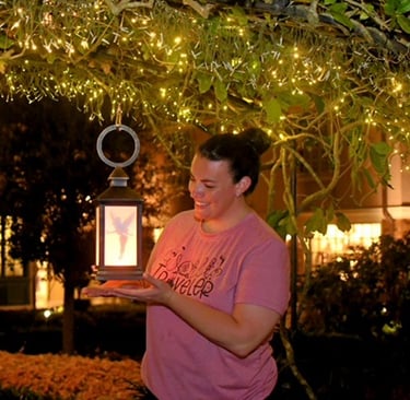 Sarah Rengulbai with a Disney lantern