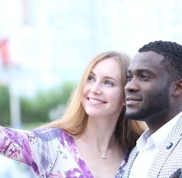 a man and woman taking a selfie to create 3D cartoon characters