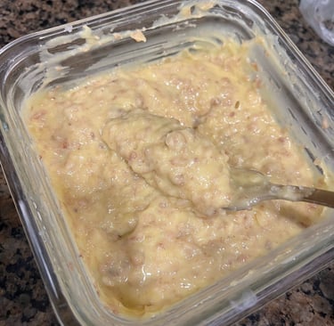 Creamy bone marrow butter mixture in a bowl showing consistency