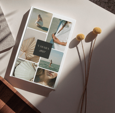 a book with a picture of a woman in a white shirt and a book with