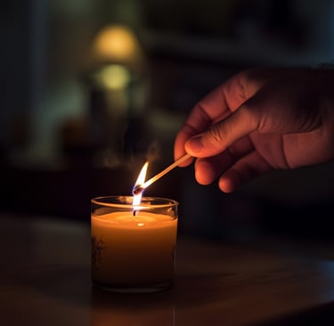 Hand lighting a candle. Art by ai&me
