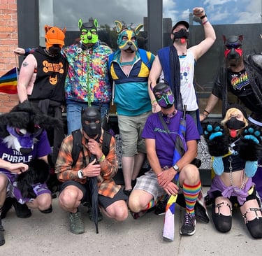 A group of friends posing in pup masks.