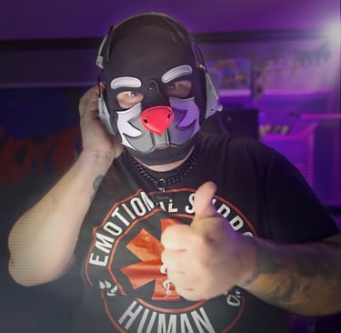 Man in a pup mask and headphones.