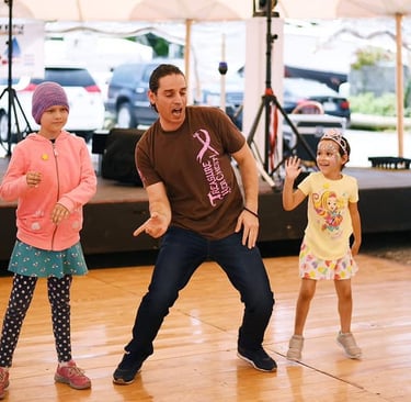 Mekhael Srour and his students dancing