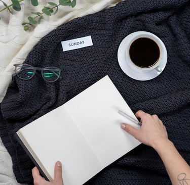 “Hands holding a journal, representing clarity, reflection, and grounded growth.