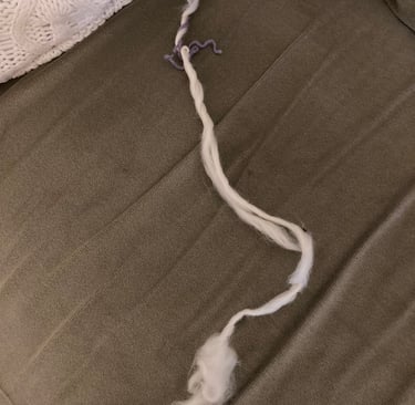 A beginner attempt at spinning wool 