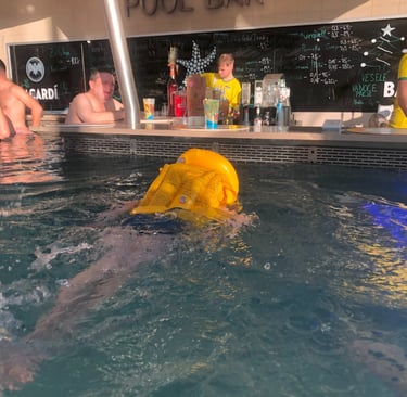 Child swimming to the swim to bar in the Aquapalace water park Prague Czech Republic