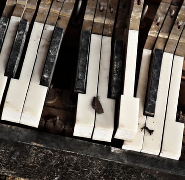 Smashed up broken piano