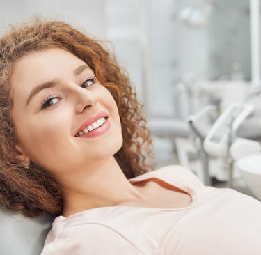 Paziente che sorride, studio dentistico gambara