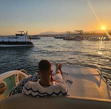 Man enjoy the sunset at yacht in marbella