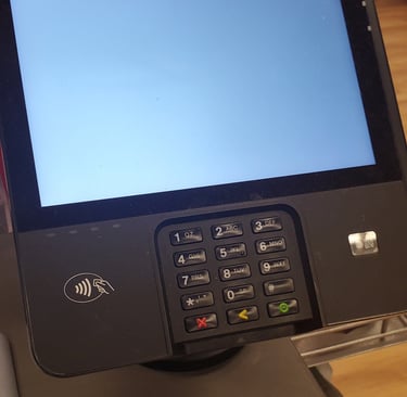 point of sale  pin pad on retail counter