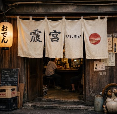 Traditional Kasumiya Izakaya entrance with noren curtains and paper lanterns in a Tokyo alleyway.