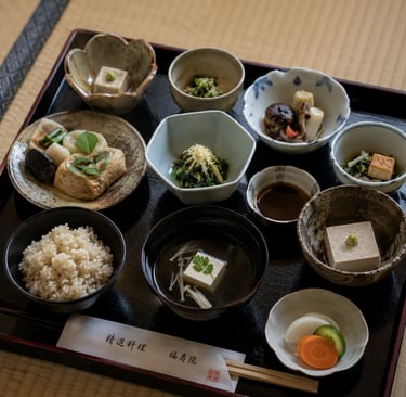 Traditional Japanese Shojin Ryori Buddhist vegan meal served on a black tray with rice, miso soup, and tofu.