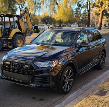 Black sedan gleaming after high-quality mobile car detailing in Las Vegas