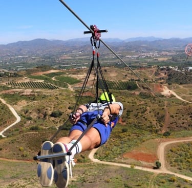 ZIPLINE RIDE overlooking mountains