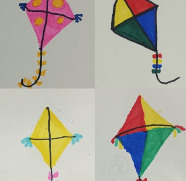 four different colored sketched kites