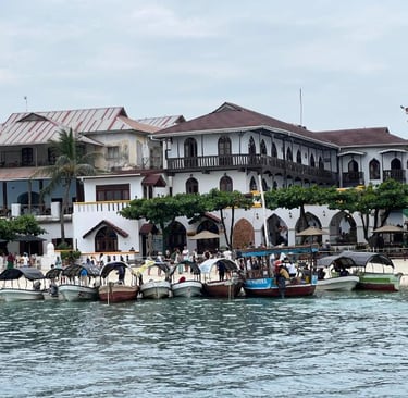 Stone Town Zanzibar walking tour through historic alleys, carved wooden doors, and vibrant local markets