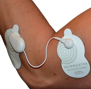 Painmaster patches attached to an elbow.