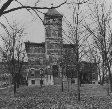 Old adminstration and dormatory building on campus around the 1890s.